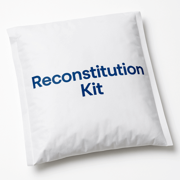 A padded white envelope with the words "Reconstitution Kit" on the front.